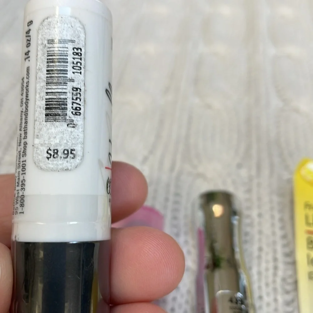 New Unused Lip gloss/balms lot of 4. Vanilla strawberry burst cocoa kiss lemon